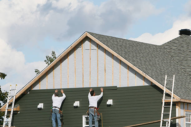 Professional Emergency Siding Repair technician working in Prides Crossing, MA